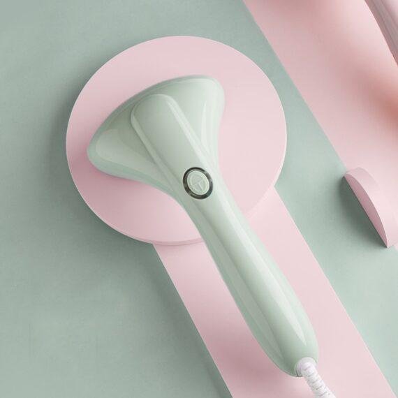 Hand-held ironing machine